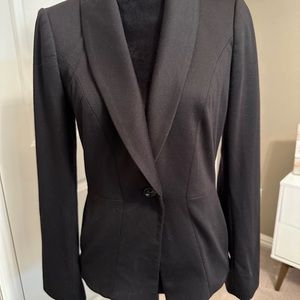 White House Black Market size 4 black jacket with contrasting polka dot interior